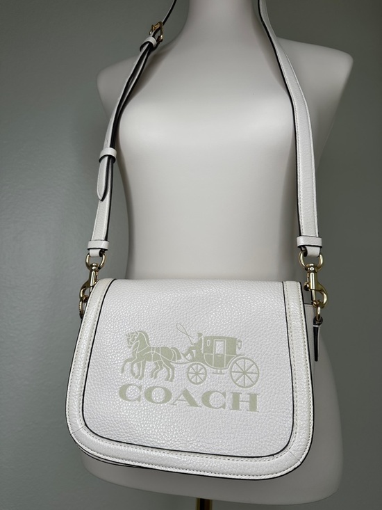 Coach Handbags - Coach White authentic Pebbled Leather Logo Saddle Crossbody